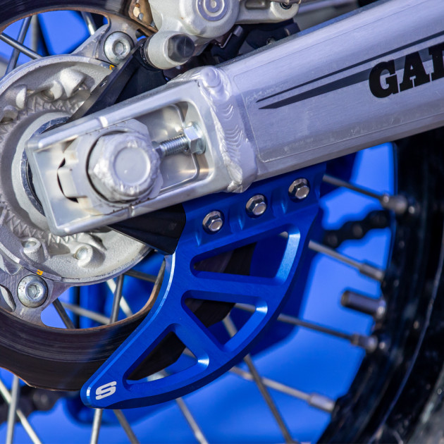 BRAKE CALIPER SUPPORT WITH BRAKE DISC GUARD